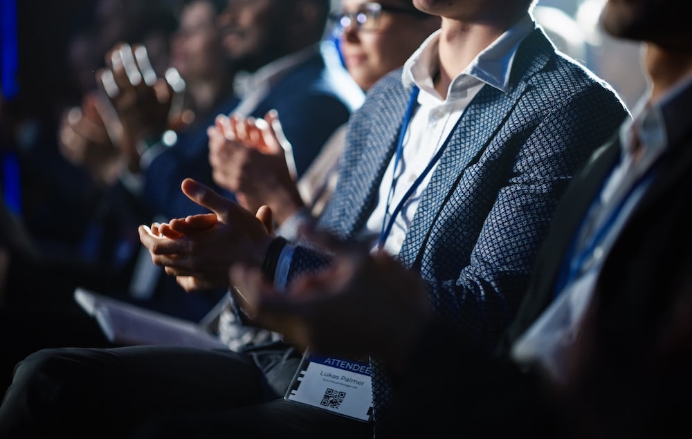 Close,Up,On,Hands,Of,A,Crowd,Of,People,Clapping Vegas attending tech conference